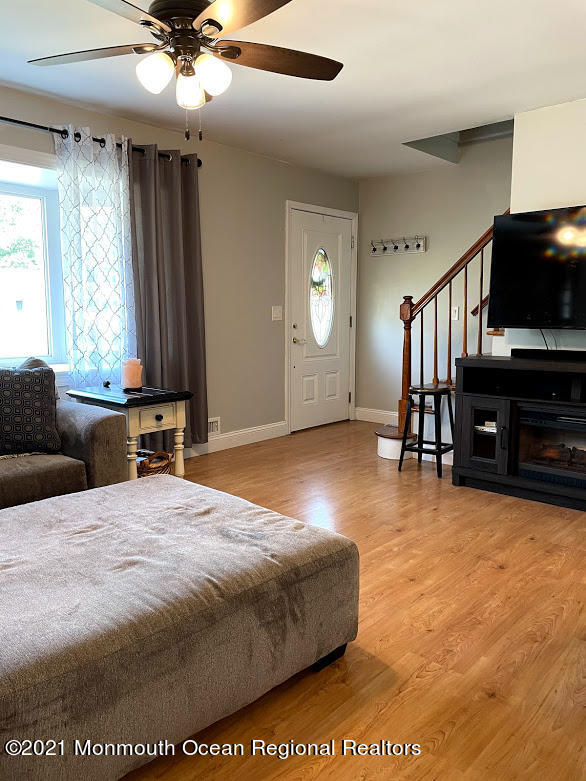 1314 Treeneedle Road Point Pleasant, NJ 08742 - Photo 21 of 62 a bed room with a bed and a television
