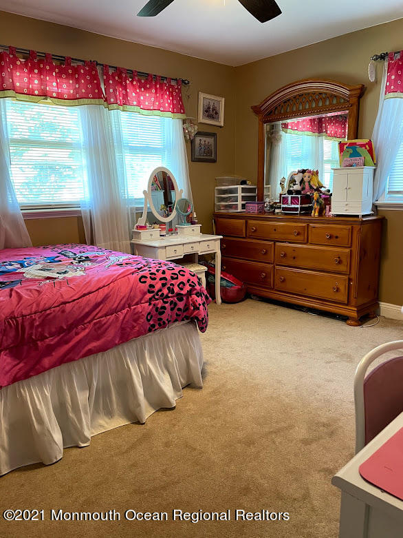 1314 Treeneedle Road Point Pleasant, NJ 08742 - Photo 40 of 62 a bedroom with a bed and window