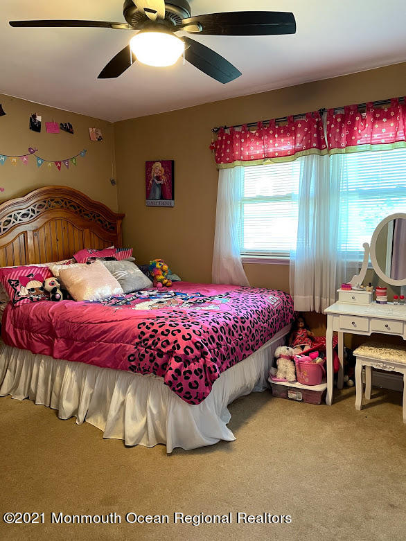 1314 Treeneedle Road Point Pleasant, NJ 08742 - Photo 41 of 62 a bedroom with a bed and window