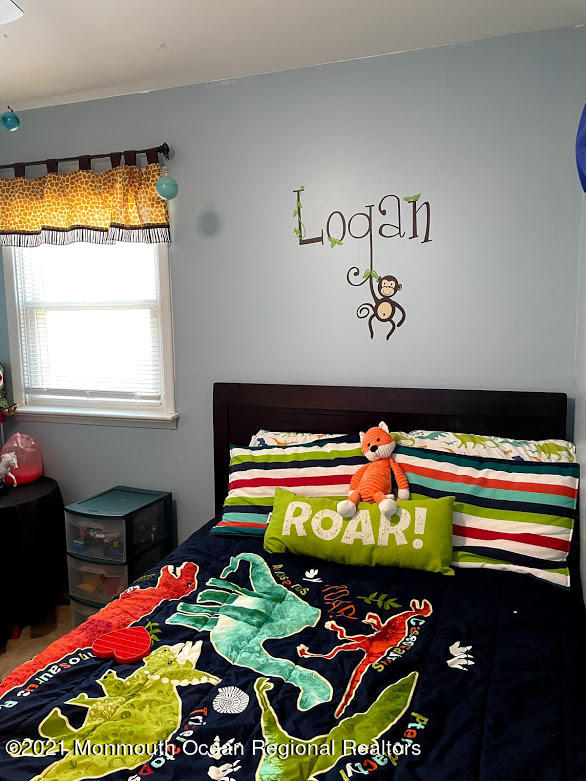 1314 Treeneedle Road Point Pleasant, NJ 08742 - Photo 44 of 62 a room with toys and flowers