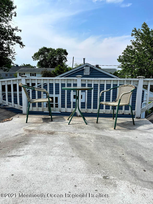 1314 Treeneedle Road Point Pleasant, NJ 08742 - Photo 50 of 62 a view of a chairs and table in the patio