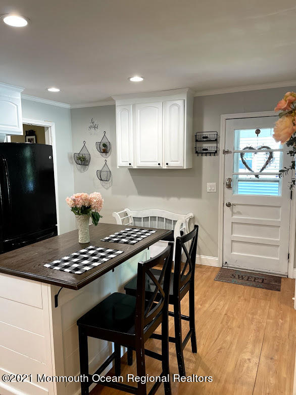 1314 Treeneedle Road Point Pleasant, NJ 08742 - Photo 7 of 62 a kitchen with stainless steel appliances granite countertop a stove a refrigerator and a microwave