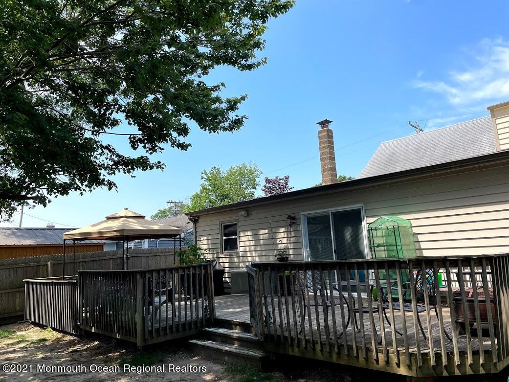 1314 Treeneedle Road Point Pleasant, NJ 08742 - Photo 61 of 62 a view of a house with a roof deck