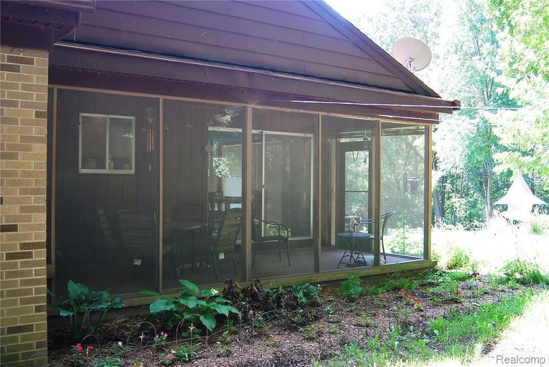 7745 Spencer Road South Lyon, MI 48178 - Photo 19 of 27 Screened-in Porch