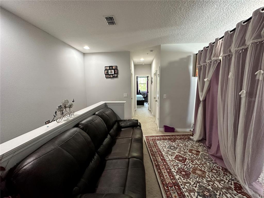 250 Rustic Loop Sanford, FL 32771 - Photo 17 of 33 a living room with furniture