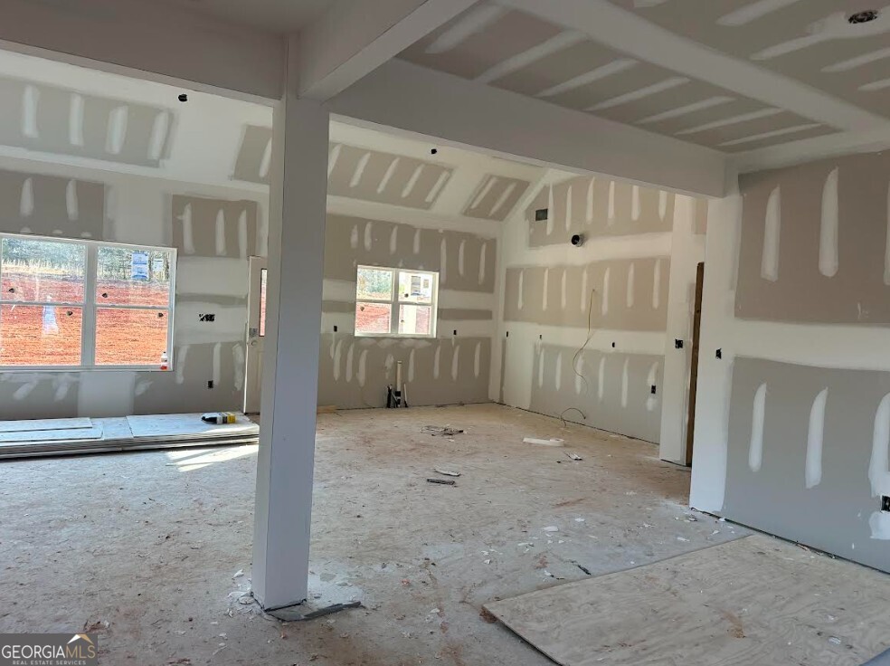 329 Ridgewood Road Jefferson, GA 30549 - Photo 3 of 12 a view of an entryway with wooden floor and windows