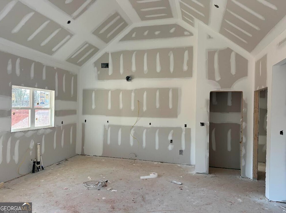 329 Ridgewood Road Jefferson, GA 30549 - Photo 4 of 12 an empty room with windows