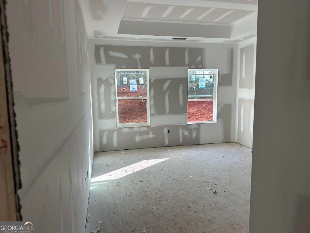 329 Ridgewood Road Jefferson, GA 30549 - Photo 5 of 12 en empty room with windows