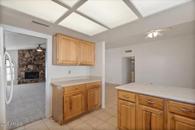 a bathroom with a sink a vanity and mirror
