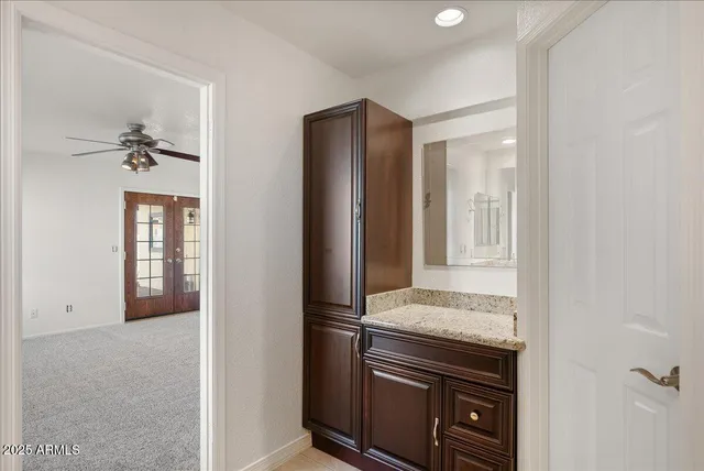 an empty room with mirror