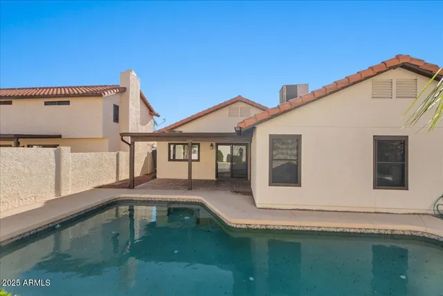 a front view of a house with yard