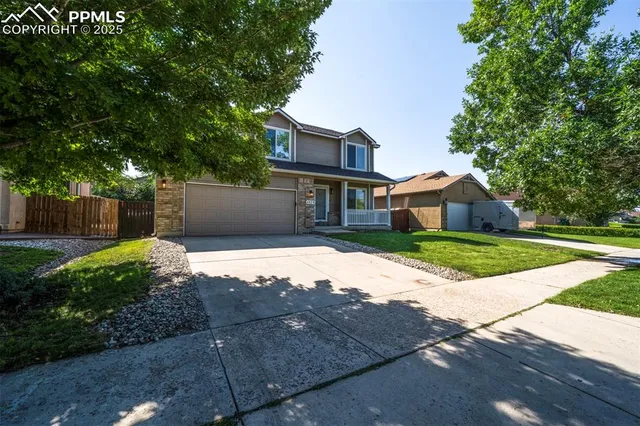 a front view of house with yard