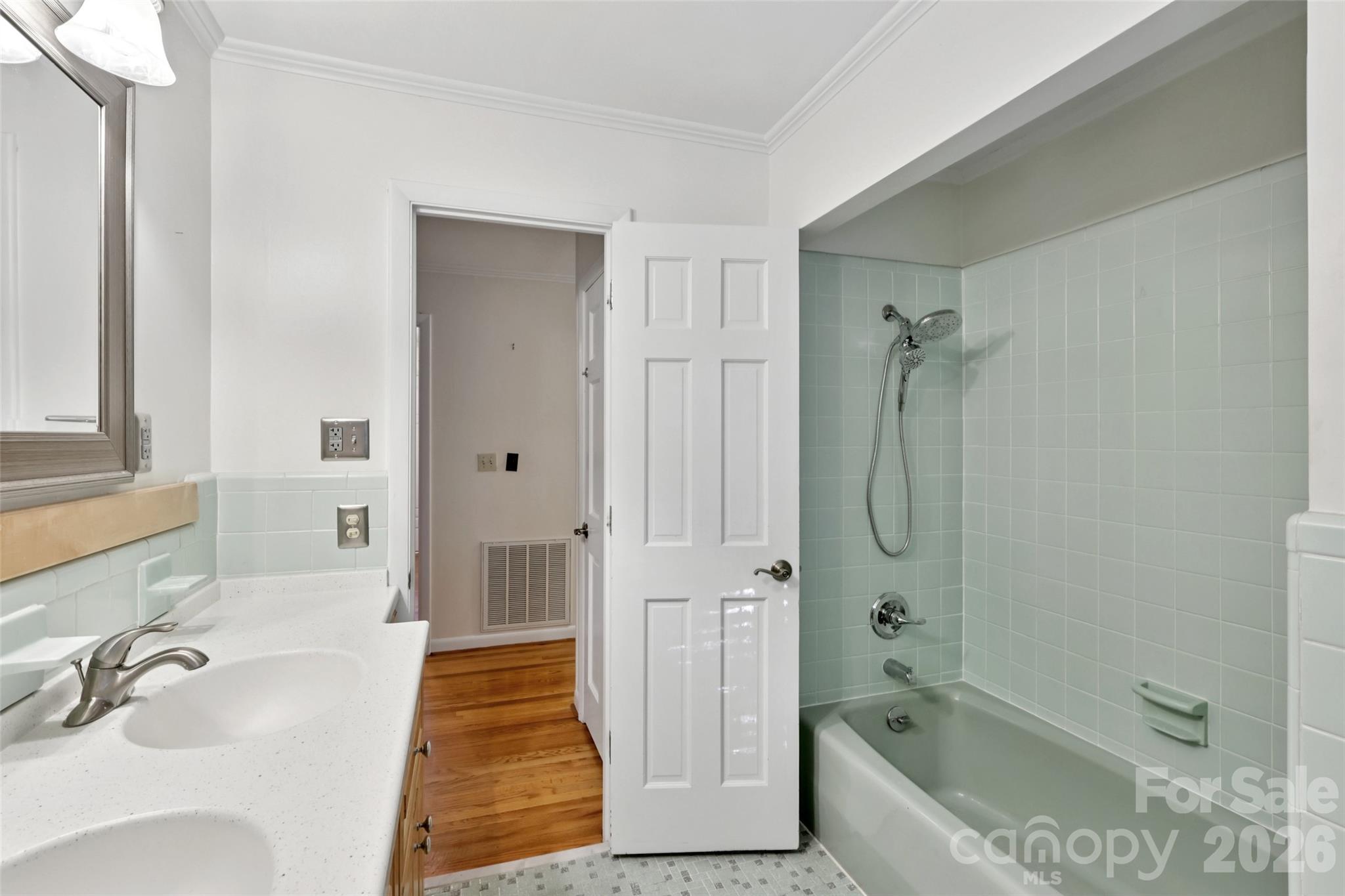 1002 Ridge Street Albemarle, NC 28001 - Photo 30 of 45 a bathroom with a bathtub shower sink and toilet