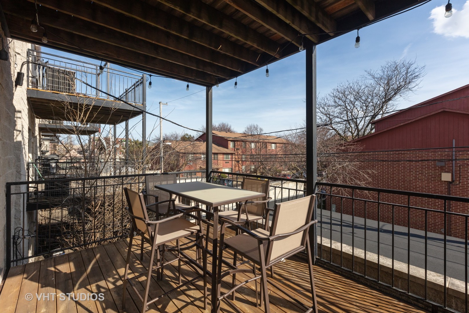 1429 West Fillmore Street, Unit 2 Chicago, IL 60607 - Photo 13 of 14 a view of a balcony with chairs