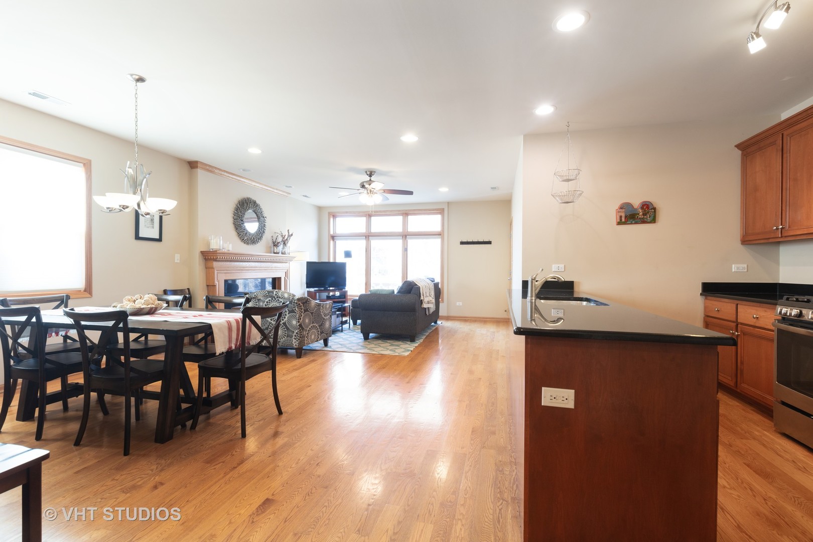1429 West Fillmore Street, Unit 2 Chicago, IL 60607 - Photo 3 of 14 a living room with lots of furniture and kitchen view