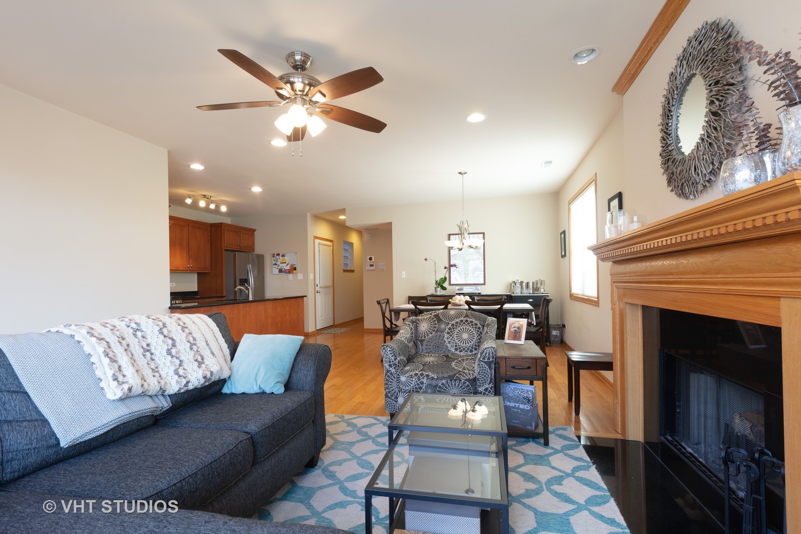 1429 West Fillmore Street, Unit 2 Chicago, IL 60607 - Photo 5 of 14 a living room with furniture and a fireplace