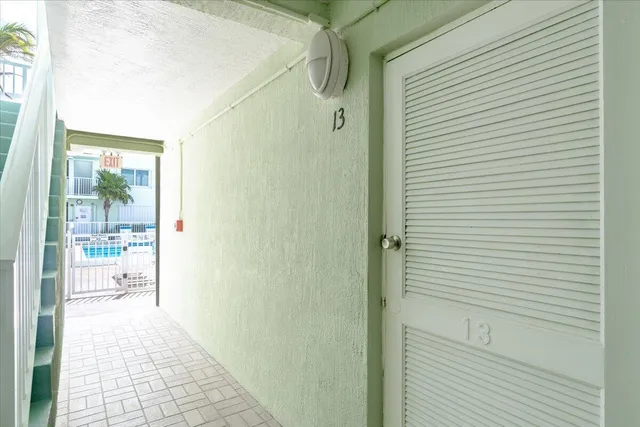 a view of a porch with a door