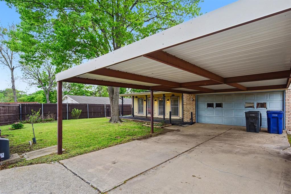 5926 Rosehill Road Garland, TX 75043 - Photo 25 of 26 a view of a house with backyard and porch