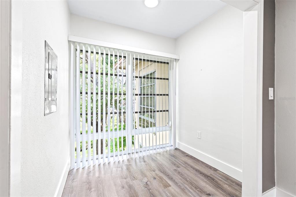 2003 Greenbriar Boulevard, Unit 16 Clearwater, FL 33763 - Photo 18 of 56 a view of entryway with wooden floor