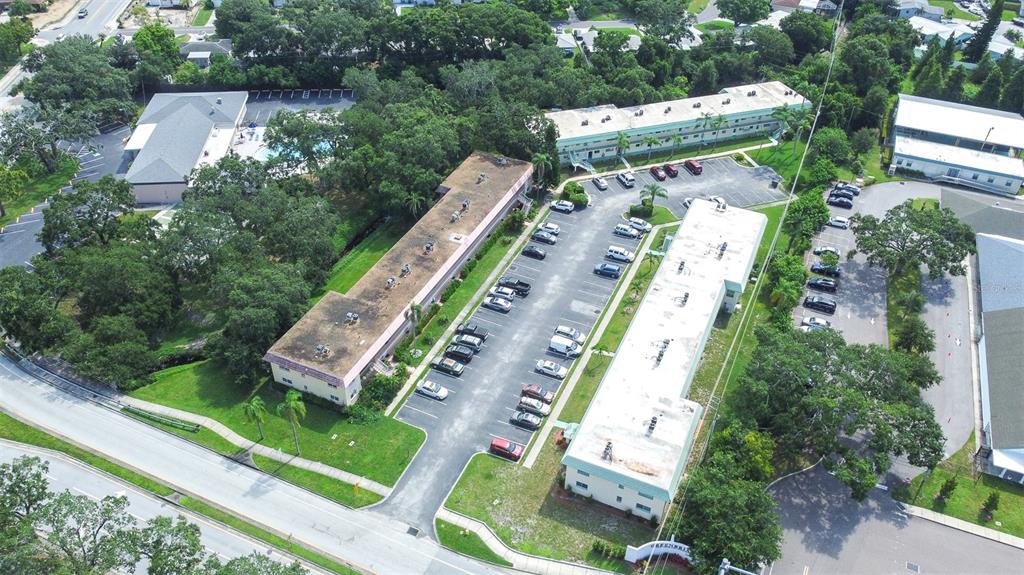 2003 Greenbriar Boulevard, Unit 16 Clearwater, FL 33763 - Photo 30 of 56 an aerial view of a house with outdoor space
