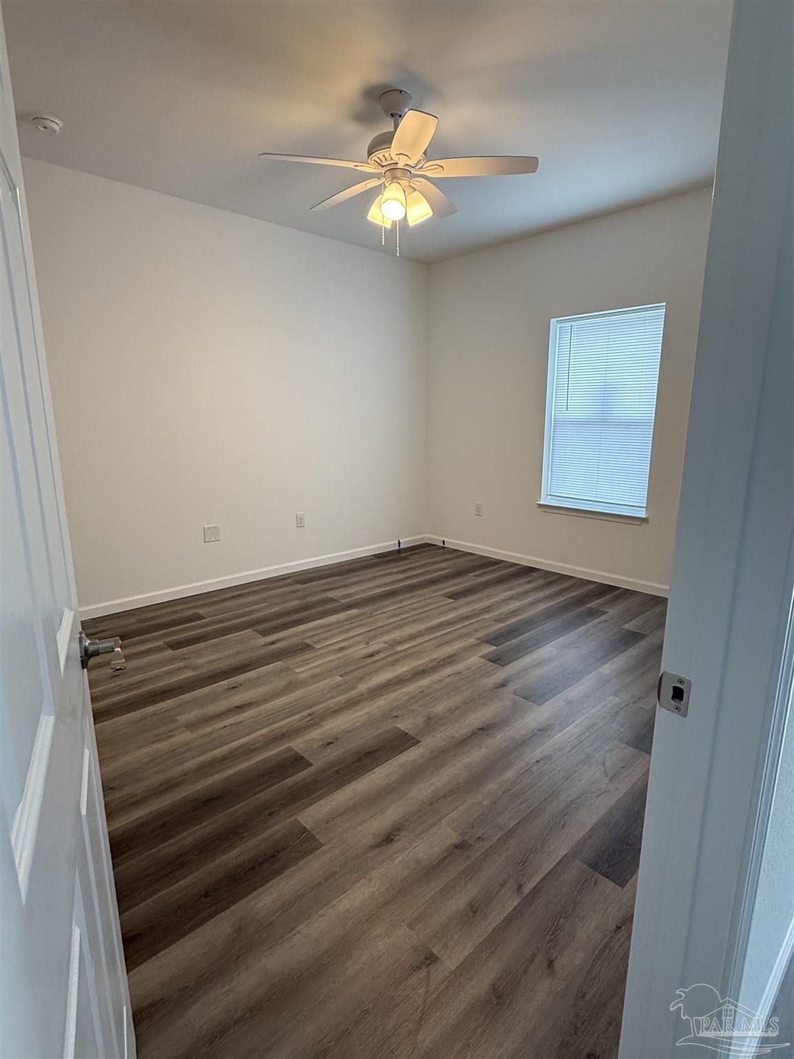 654 Nix Road Pensacola, FL 32506 - Photo 5 of 11 wooden floor in an empty room