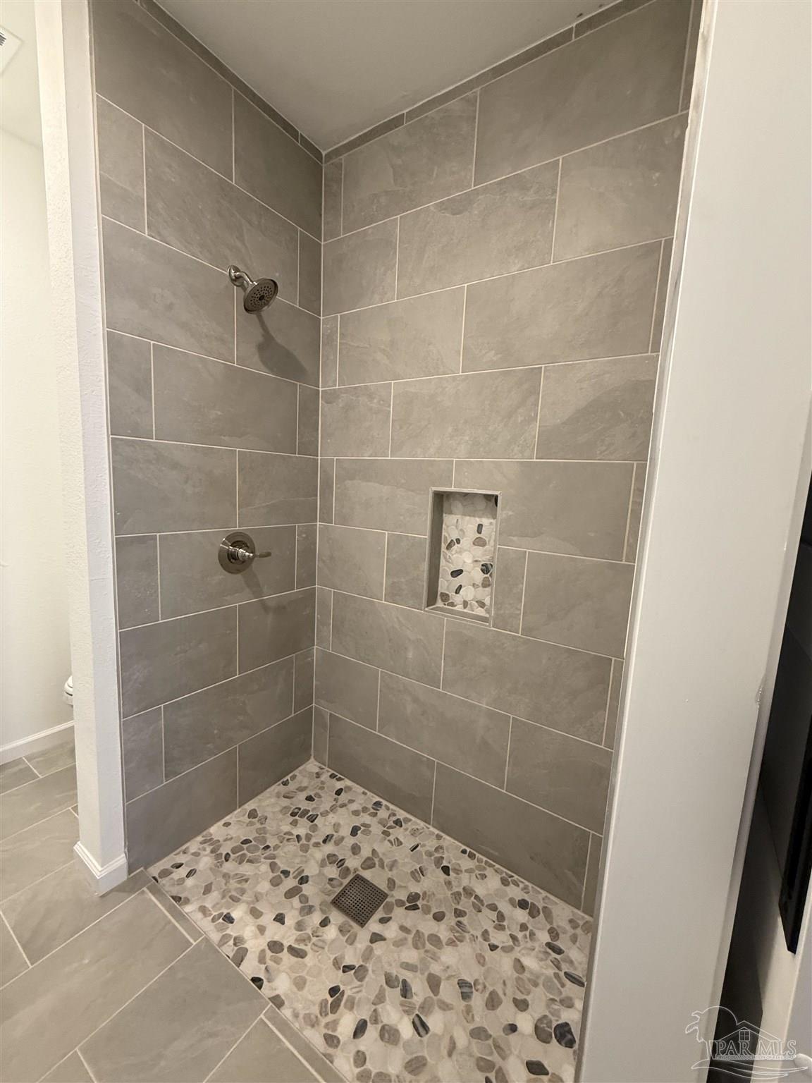 654 Nix Road Pensacola, FL 32506 - Photo 7 of 11 a bathroom with a shower
