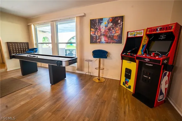 a room with furniture and wooden floor