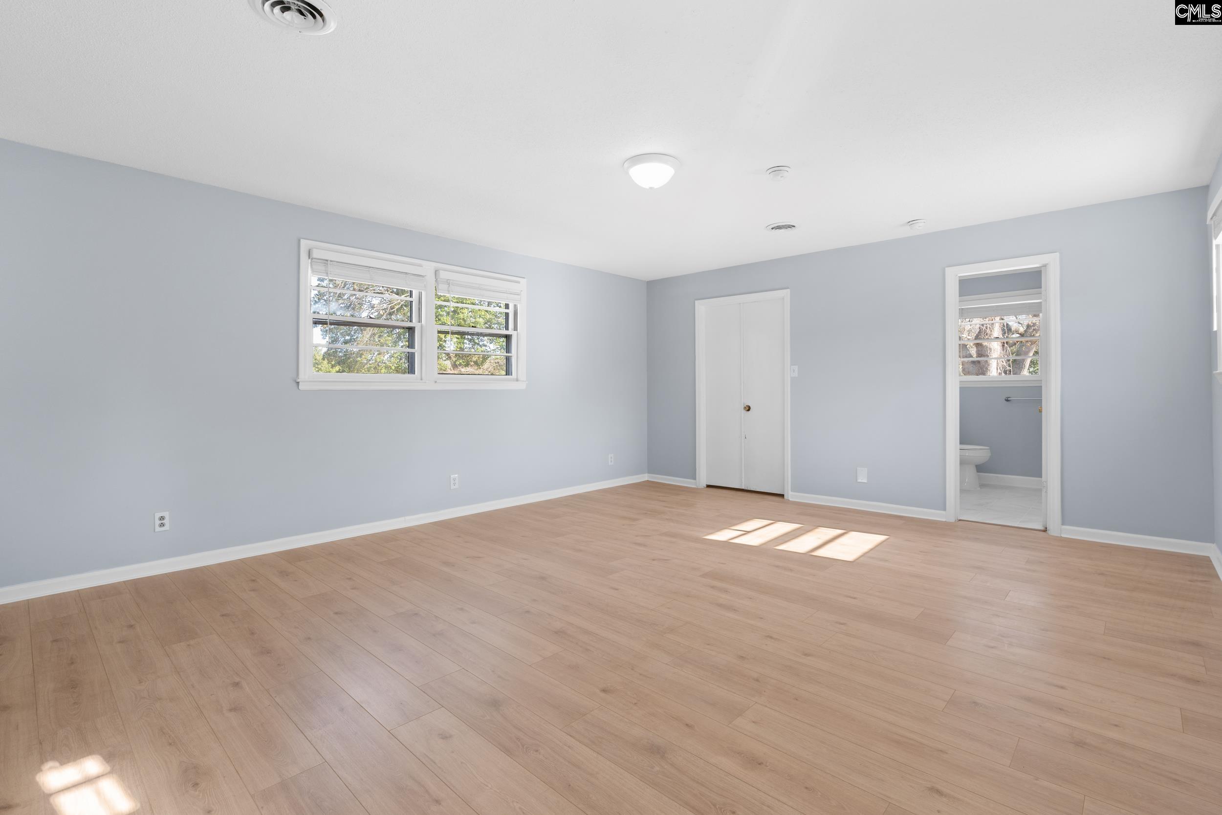 409 Wilkes Road Columbia, SC 29203 - Photo 13 of 34 a view of an empty room with a window