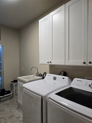 a view of livingroom with furniture and windows
