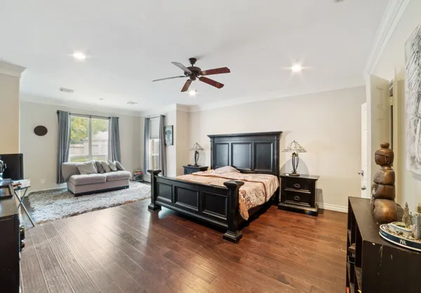 a bedroom with a bed and furniture