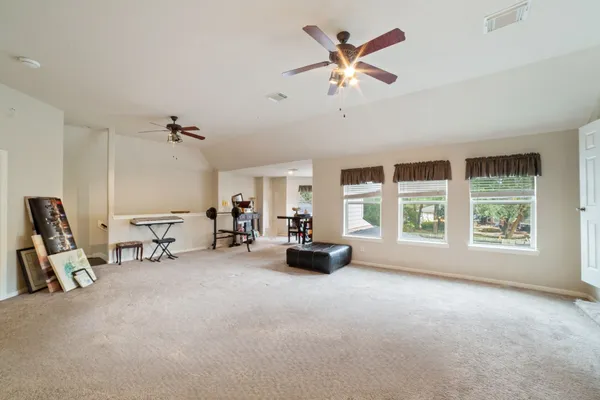 a view of livingroom with furniture and windows