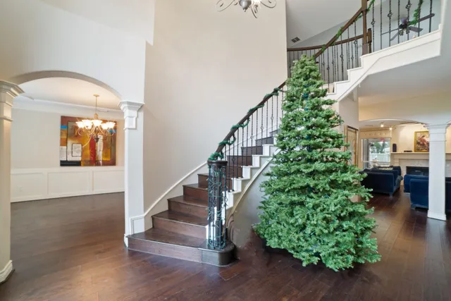 a room with furniture and wooden floor