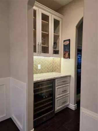 a view of kitchen and wooden floor