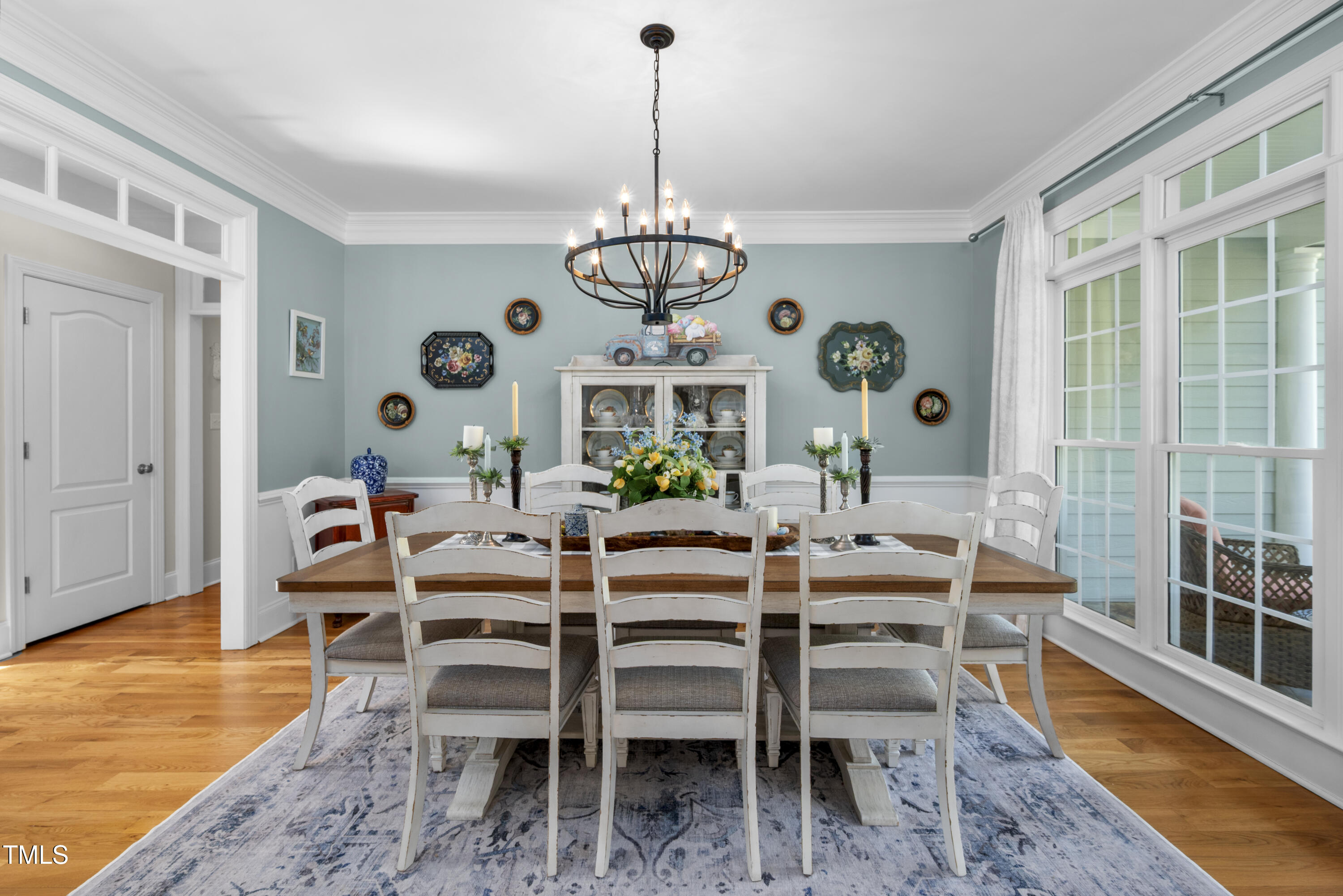8480 Falkirk Ridge Court Wake Forest, NC 27587 - Photo 14 of 63 a view of a dining room with furniture window and wooden floor