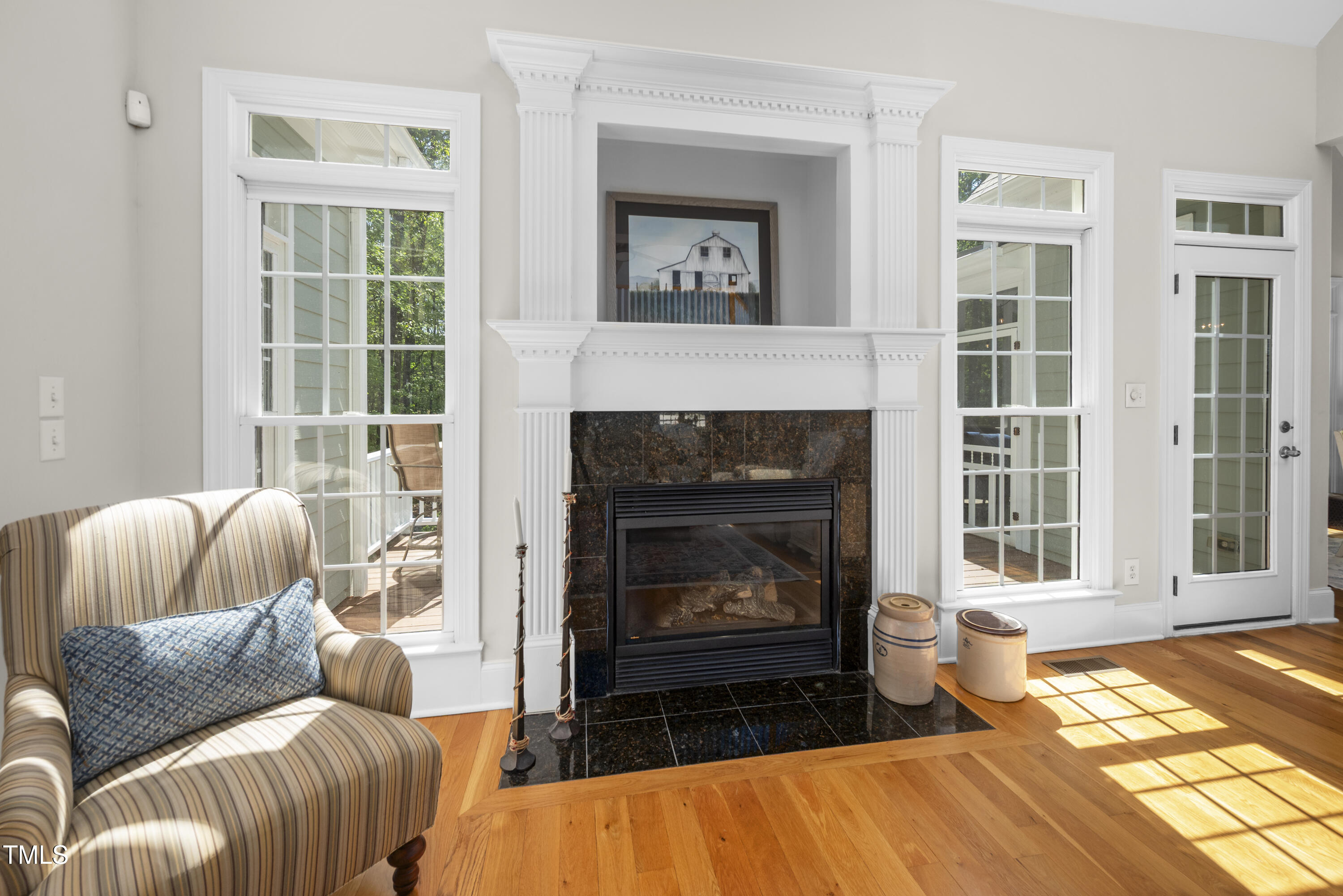 8480 Falkirk Ridge Court Wake Forest, NC 27587 - Photo 19 of 63 a living room with furniture and a fireplace