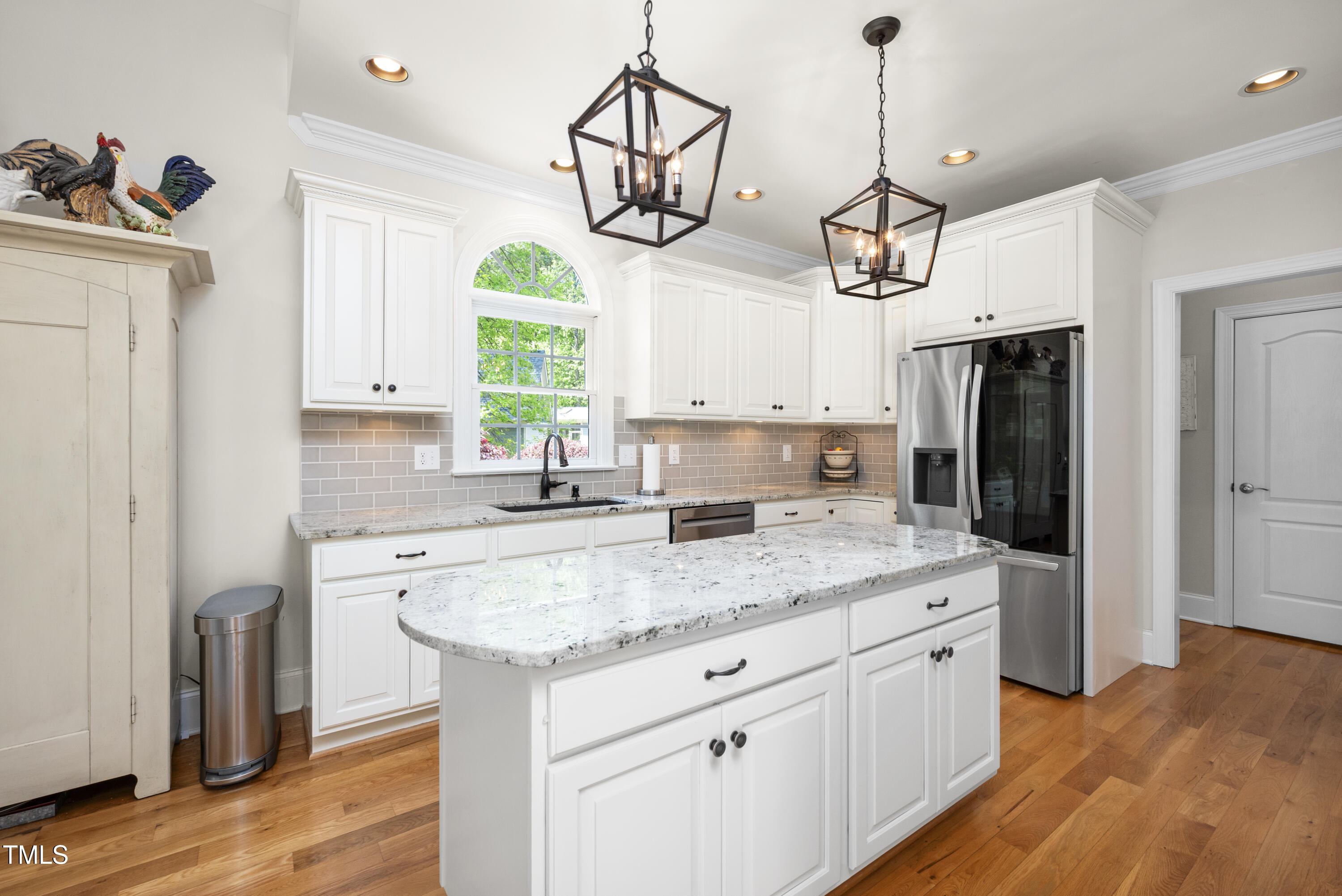8480 Falkirk Ridge Court Wake Forest, NC 27587 - Photo 21 of 63 a kitchen with a sink a counter space and stainless steel appliances