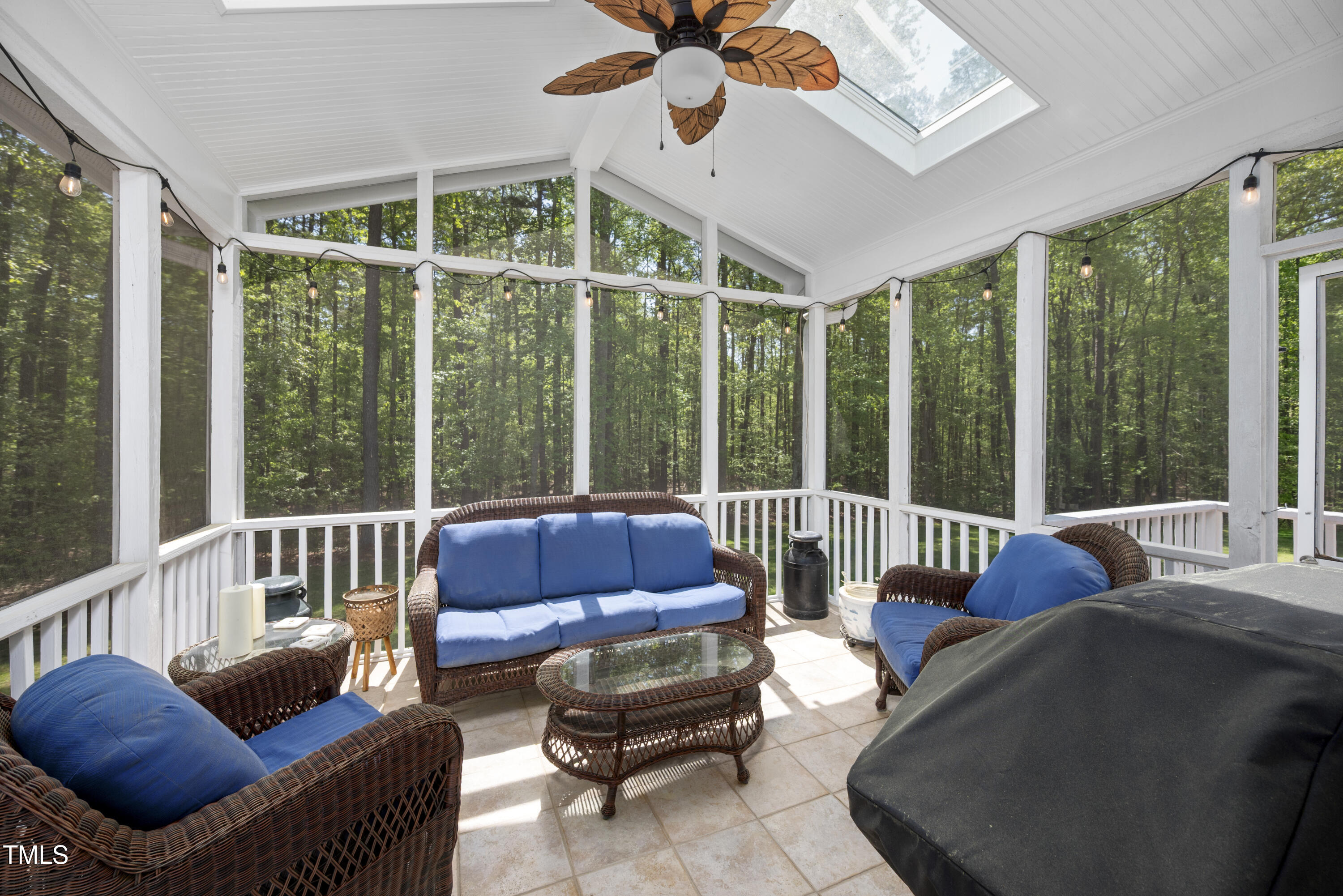 8480 Falkirk Ridge Court Wake Forest, NC 27587 - Photo 28 of 63 a living room with furniture and a large window