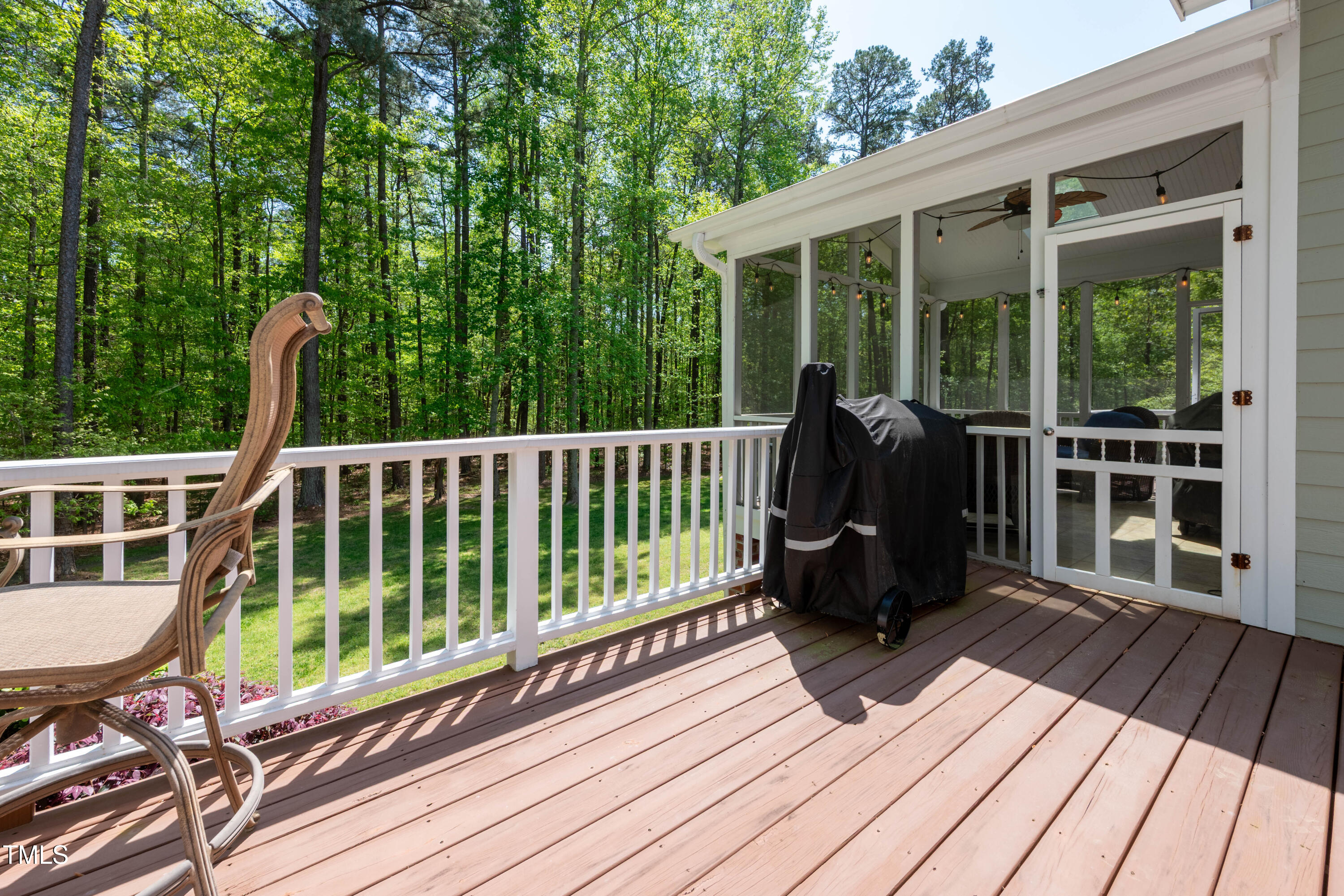 8480 Falkirk Ridge Court Wake Forest, NC 27587 - Photo 29 of 63 a view of a deck with wooden floor and furniture