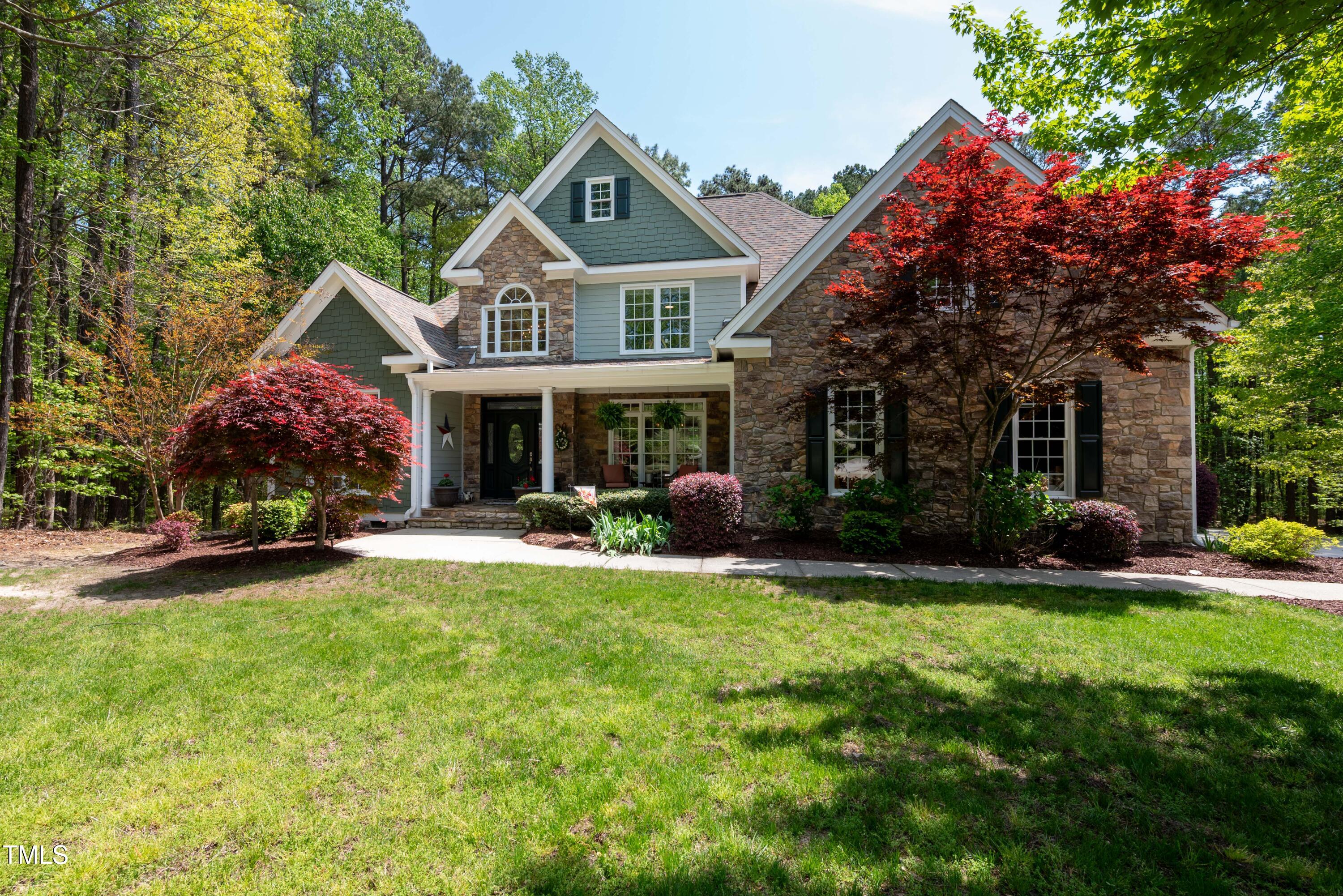 8480 Falkirk Ridge Court Wake Forest, NC 27587 - Photo 2 of 63 a front view of a house with swimming pool having outdoor seating
