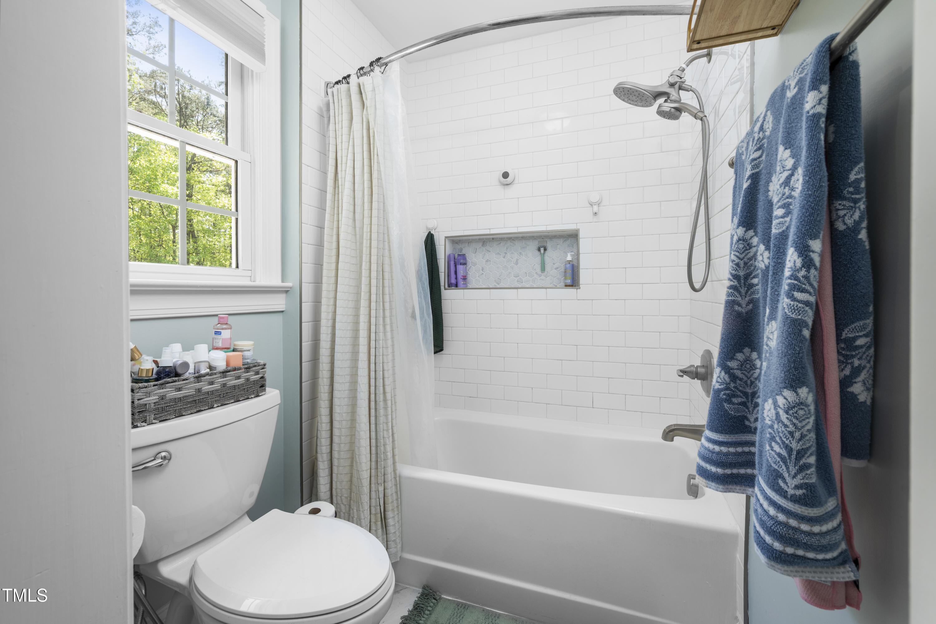 8480 Falkirk Ridge Court Wake Forest, NC 27587 - Photo 49 of 63 a white toilet sitting next to a bath tub shower