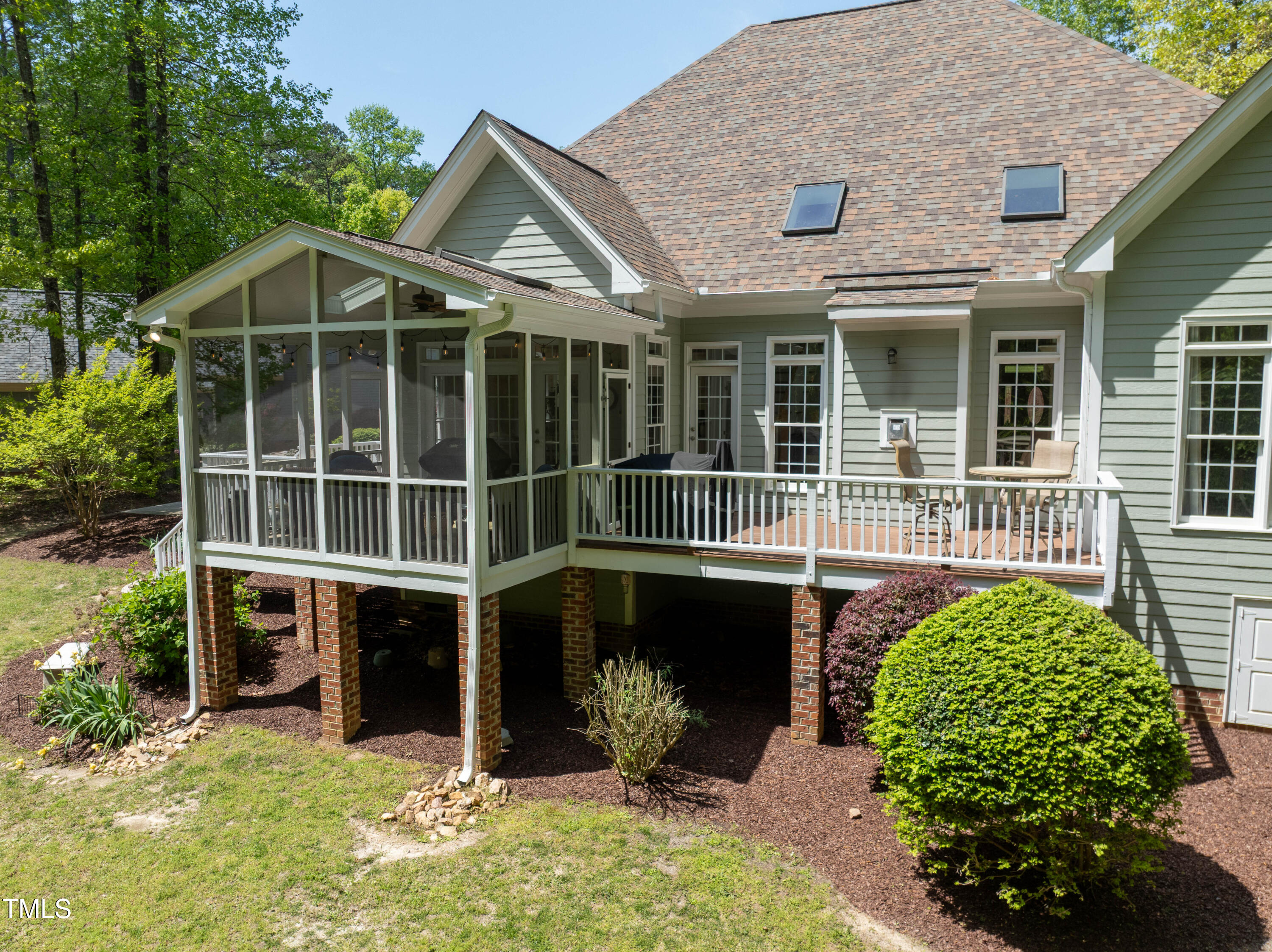 8480 Falkirk Ridge Court Wake Forest, NC 27587 - Photo 4 of 63 a view of a house with a yard and potted plants