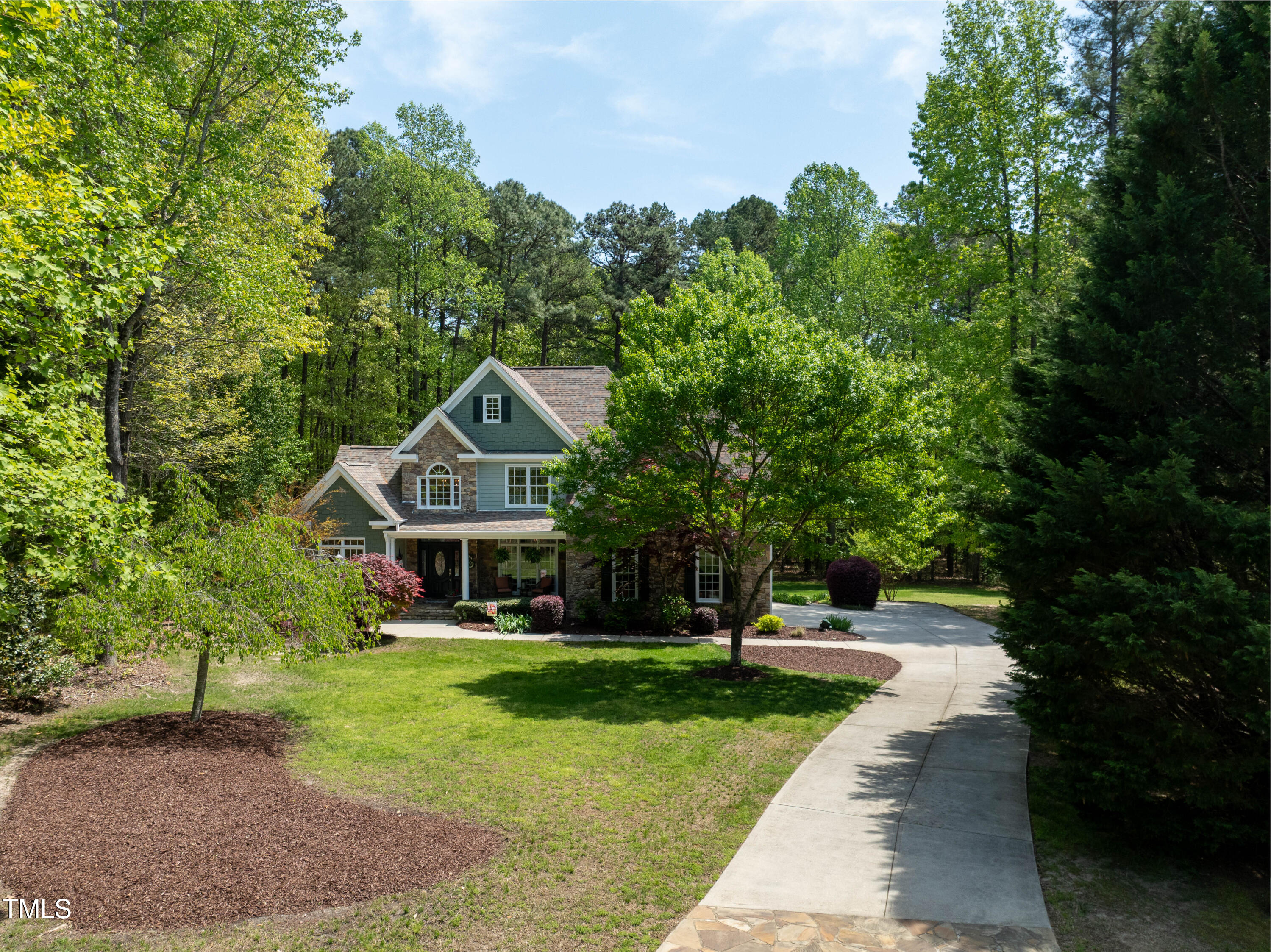 8480 Falkirk Ridge Court Wake Forest, NC 27587 - Photo 59 of 63 a house view with a garden space