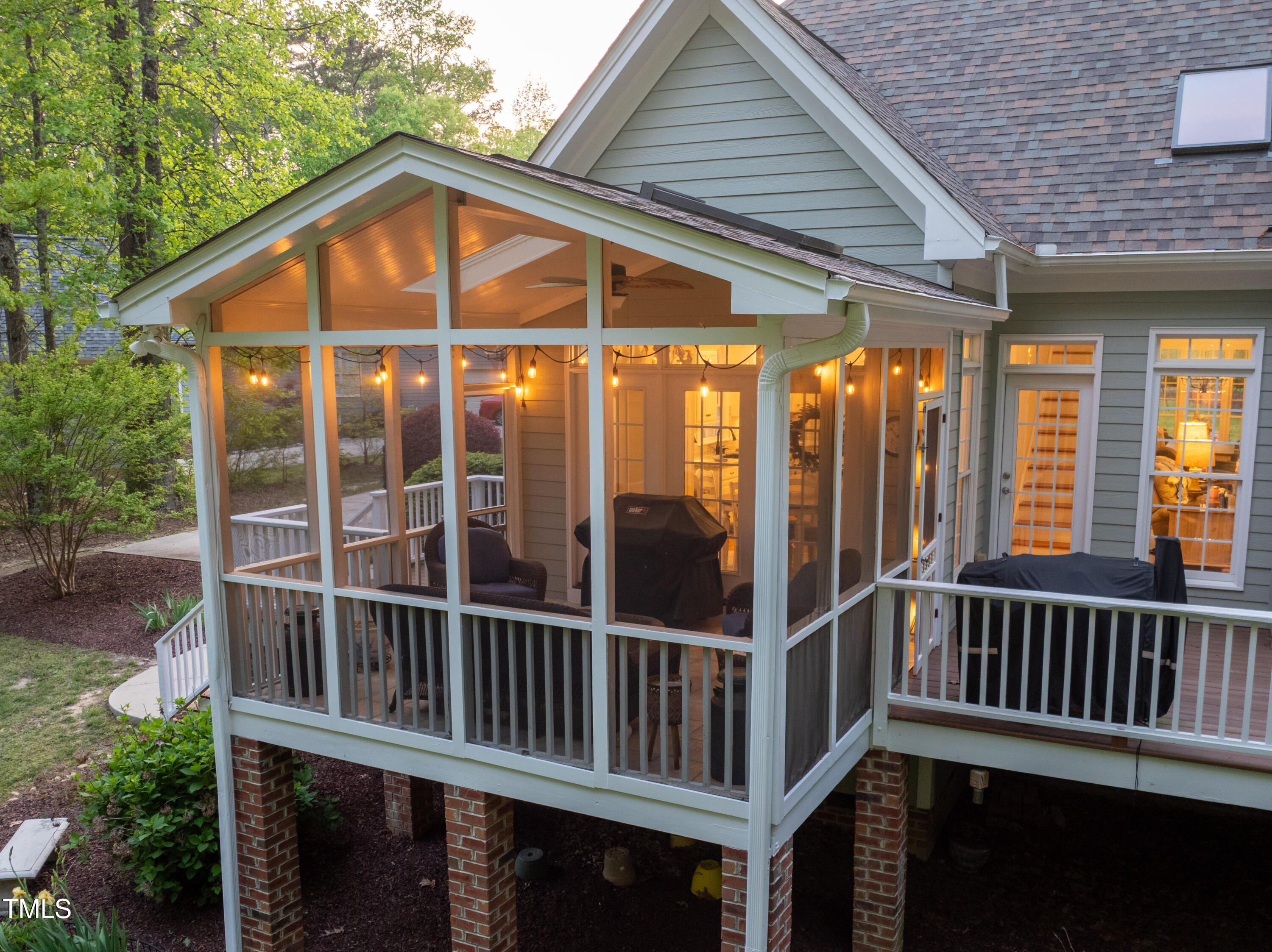 8480 Falkirk Ridge Court Wake Forest, NC 27587 - Photo 5 of 63 a view of a house with a wooden deck