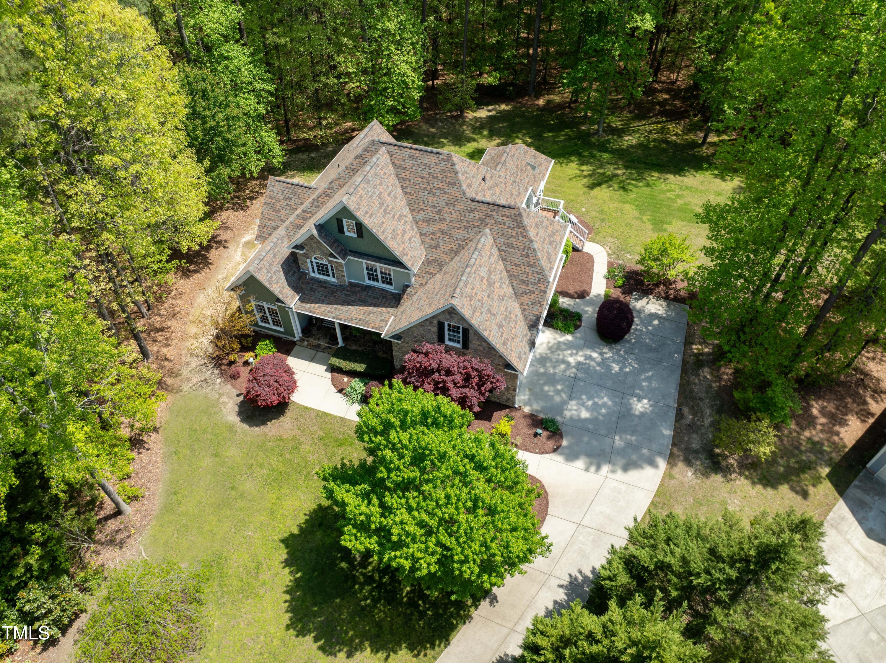 8480 Falkirk Ridge Court Wake Forest, NC 27587 - Photo 6 of 63 an aerial view of a house with a yard basket ball court and outdoor seating