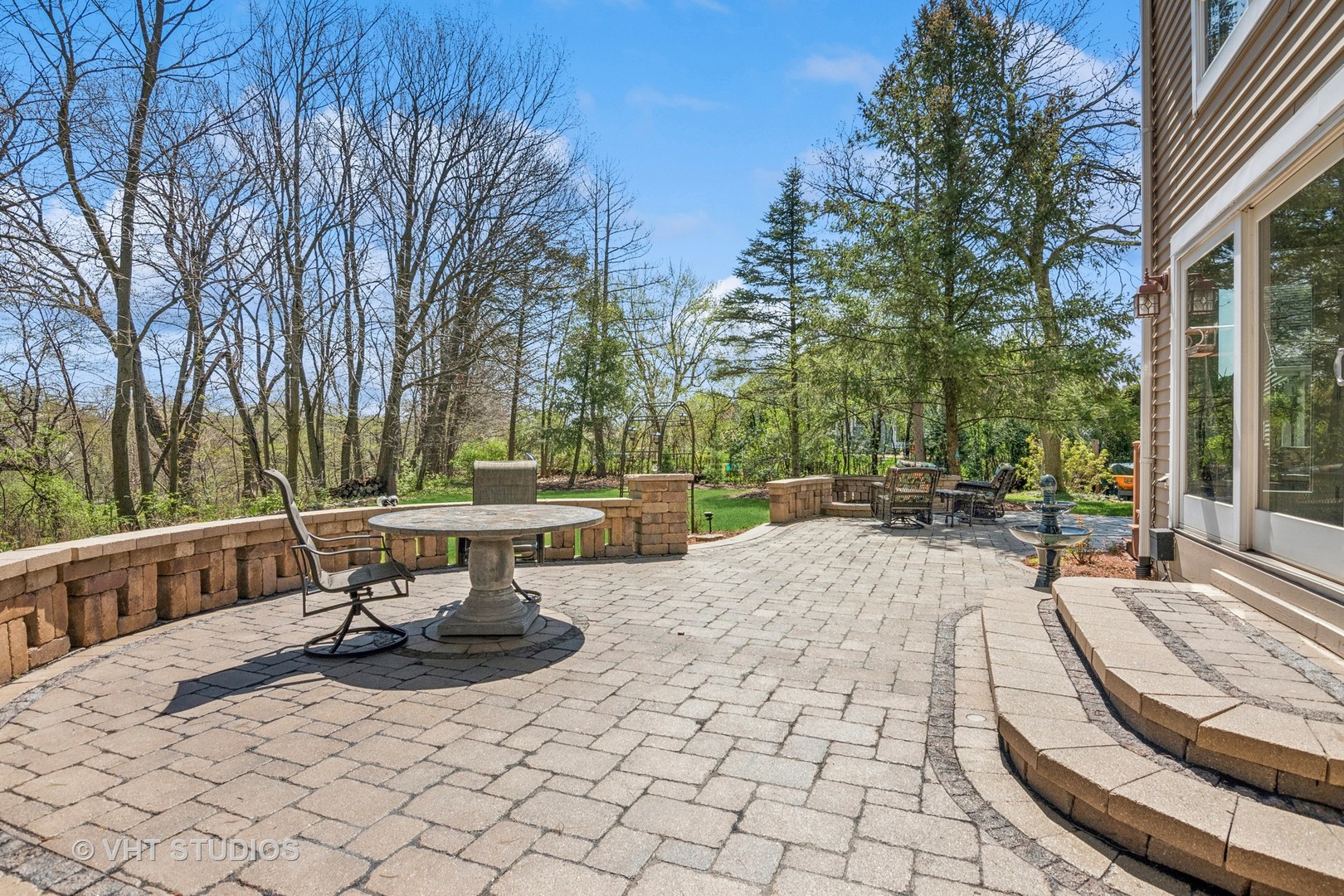59 2s283 Route Warrenville, IL 60555 - Photo 11 of 49 a view of a swimming pool with a patio