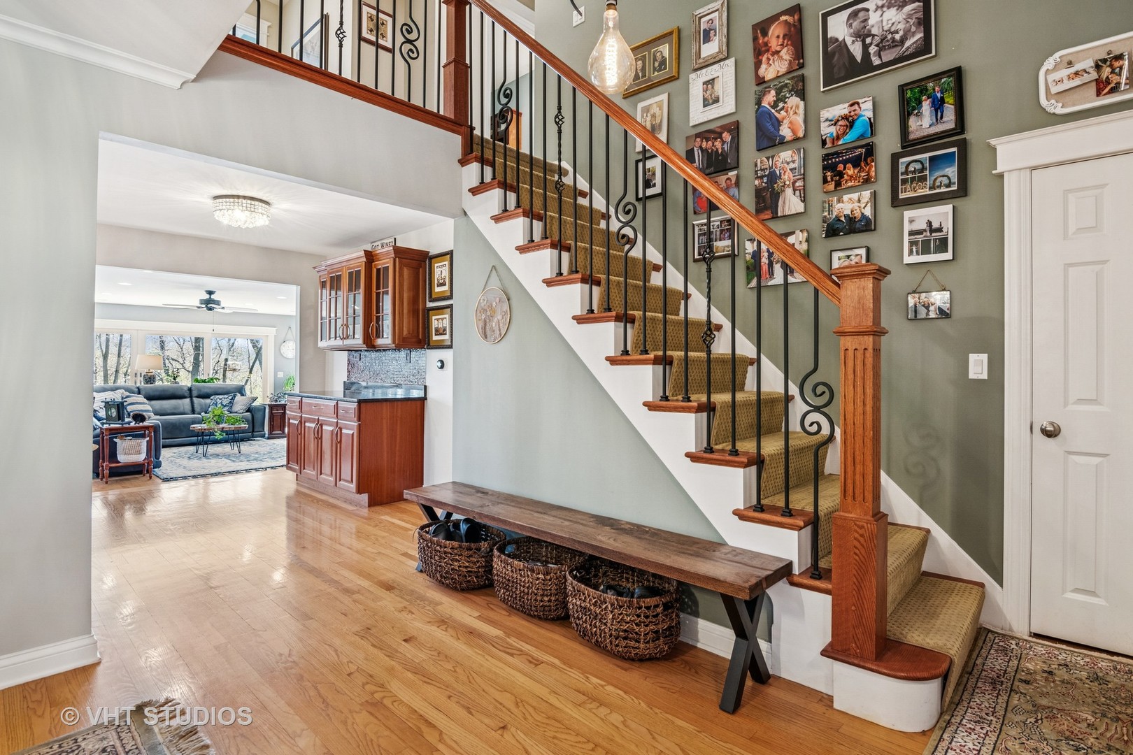 59 2s283 Route Warrenville, IL 60555 - Photo 19 of 49 a view of entryway and hall with wooden floor