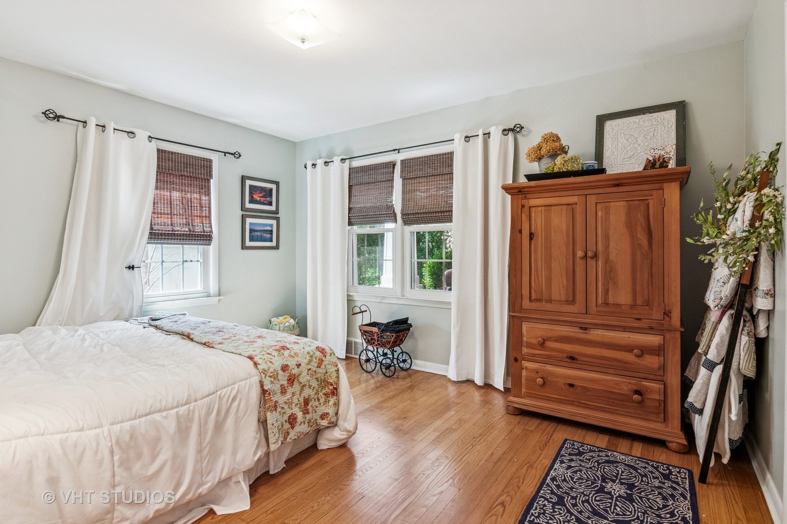 59 2s283 Route Warrenville, IL 60555 - Photo 31 of 49 a bedroom with a bed and a window