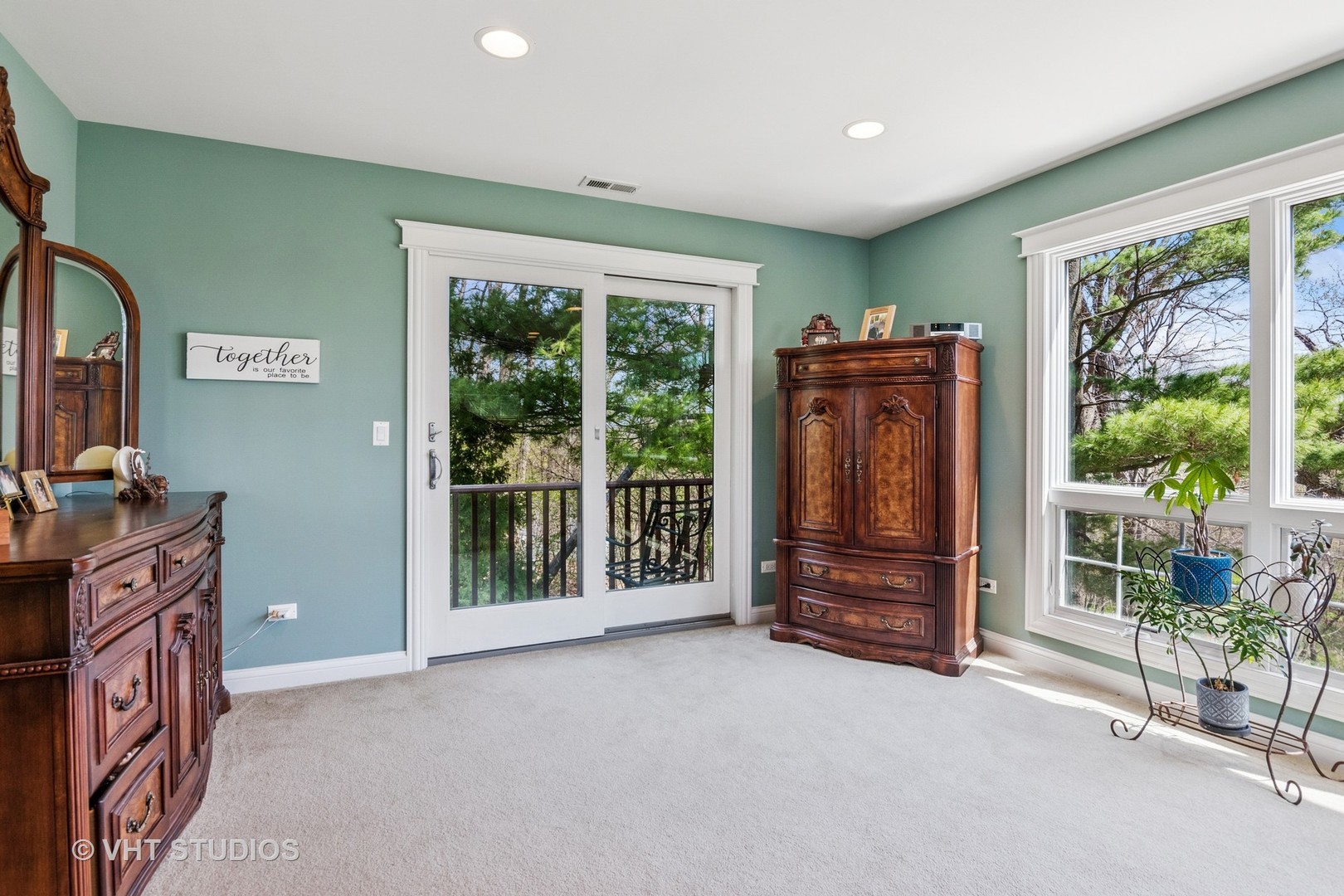 59 2s283 Route Warrenville, IL 60555 - Photo 40 of 49 a view of an empty room with furniture a flat screen tv and floor to ceiling window