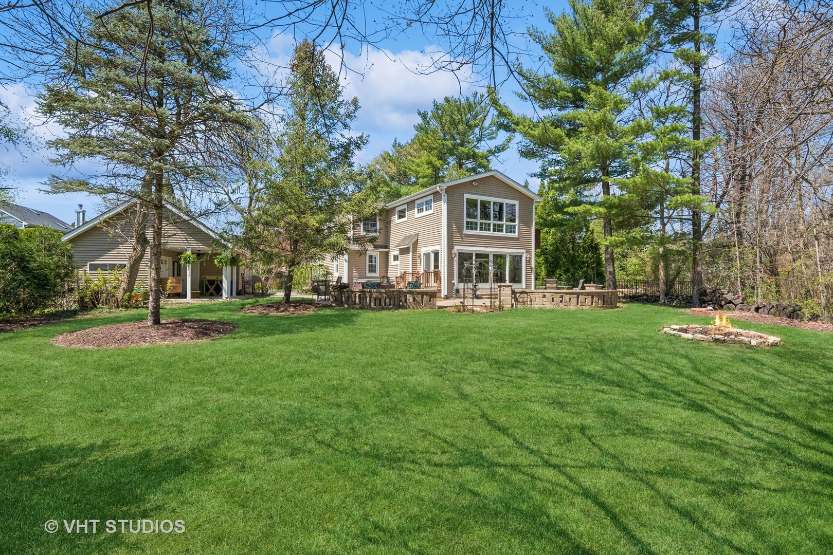 59 2s283 Route Warrenville, IL 60555 - Photo 8 of 49 a front view of a house with a yard