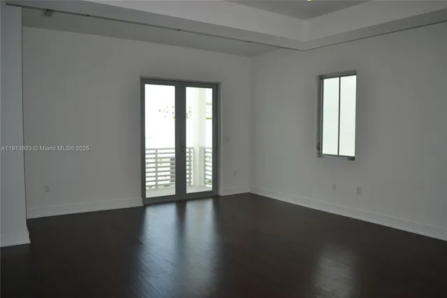 a bathroom with a bathtub and a sink